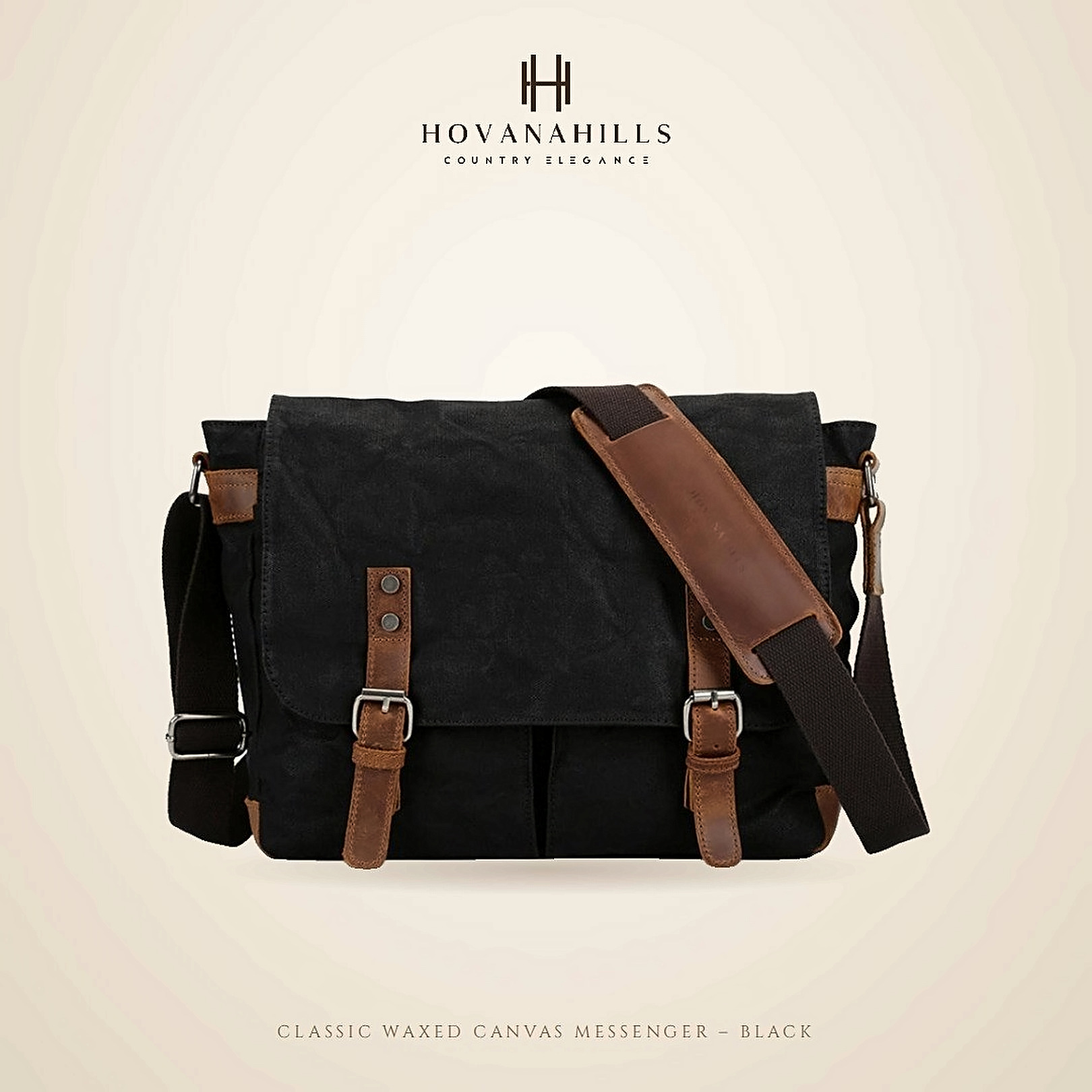 Black waxed canvas messenger bag, additional studio angle
